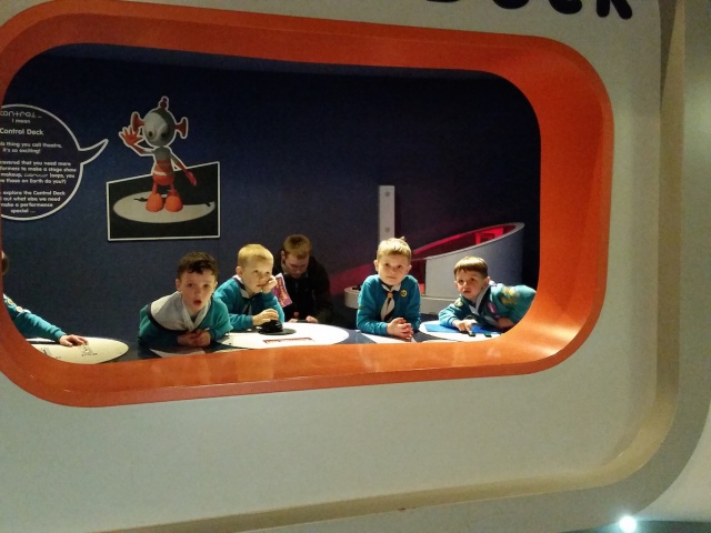 four beaver scouts are looking at the camera.